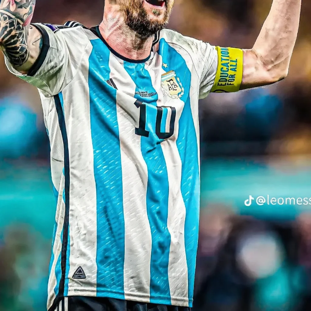 Argentina player number 10 raising arms with yellow armband