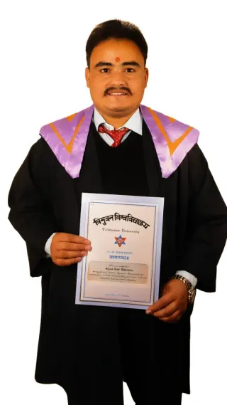 Man in academic robes holding a certificate with Hindi text